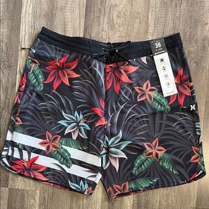 Hurley Black and Red Board Shorts with Tropical Flair